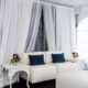 White Lounge Furniture With Antique Side Tables & Custom Draping