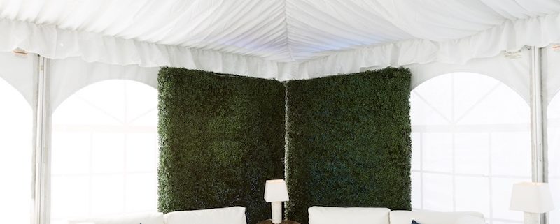 White Axis Lounge With Garden Walls, White Area Rug, Black Astro Turf & Side Tables