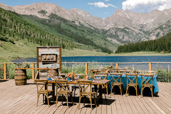 Piney River Ranch outdoor event bar and farm tables - Ali + Garrett Photography